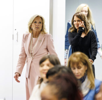 First lady Jill Biden, left, and actress Halle Berry walk in to a roundtable on women's health at the University of Illinois Chicago Illinois Neuropsychiatric Institute, Thursday, Jan. 11, 2024, in Chicago. (Anthony Vazquez/Chicago Sun-Times via AP, Pool) ORG XMIT: ILCHS805
                  