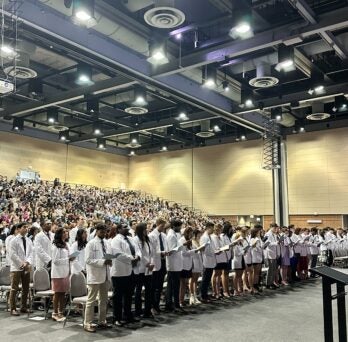 Incoming M1s Read the Medical Students' Oath at the 30th Annual White Coat Ceremony in Chicago 