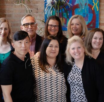 Members of the Midwest AIDS Training and Education Center pose for a group photo
                  